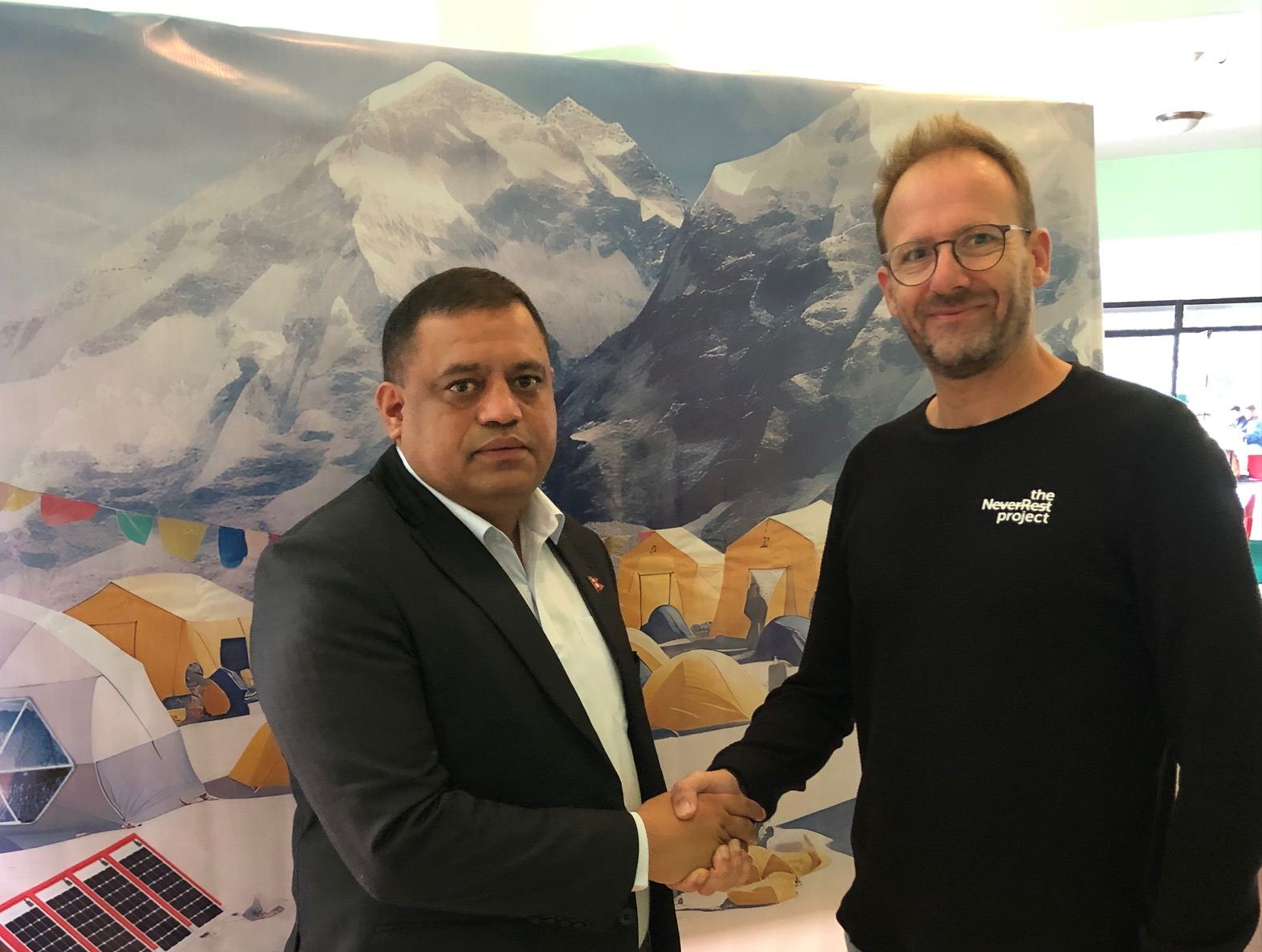 CEO of Nepal Tourism Board (NTB), Dhananjay Regmi, and the CEO and founder of The NeverRest Project, Frédéric Kauffmann, after the presentation of the First Everest Base Camp in Pokhara, Nepal.